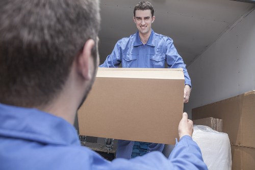 Office relocation planning in Knightsbridge with packed boxes and desks