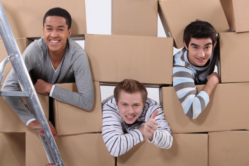 Contractor and staff observing workplace safety rules in a storage unit facility