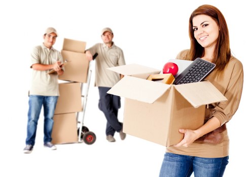 Professional movers handling items in a Knightsbridge street